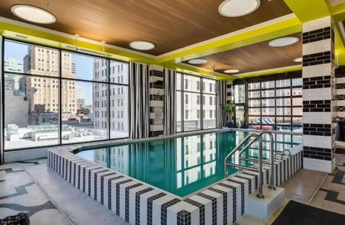 Downtown Cincinnati Apartment | CBD OTR Pool Gym Free Parking 5 Mins to Stadiums