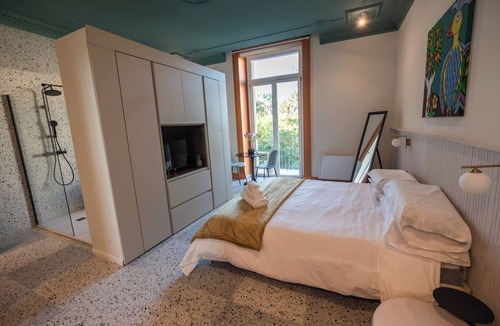 Acireale Bed & Breakfast | Charming elegant room in central Acireale with serene garden view