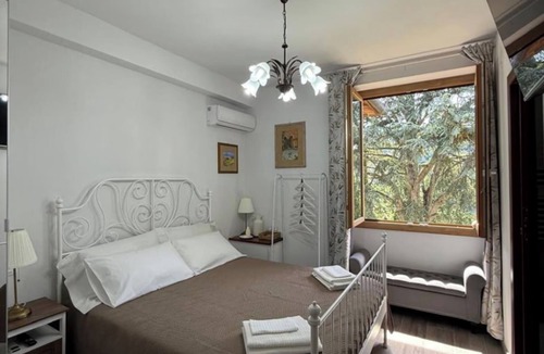 Dicomano House | Charming Guest Room in Villa Casavecchia with City, Garden, and Mountain Views