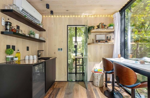 Lupton City Cabin | Cliffside Mirror Cabin