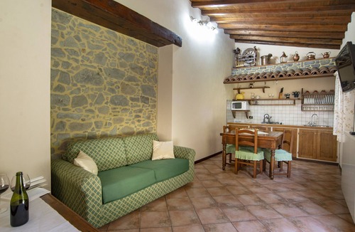 Pieve Fosciana Cottage | Comfortable 1 bedroomed apartment, pool, restaurant in village on eco-farm.
