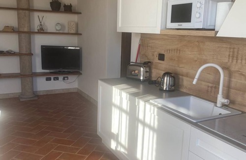 Bollano Apartment | Comfortable Flat in Asciano, air conditioning, garden with gazebo, pool, G