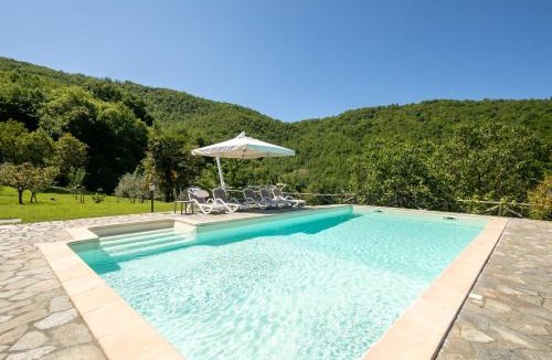 Fivizzano Villa | Country house with pool and outbuilding Fivizzano by VacaVilla