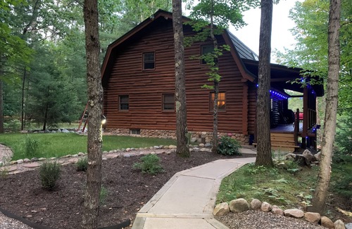 Manitowish Waters Cabin | Cozy Lakeside Log Cabin with fireplaces/Central AC on Manitowish Waters Chain.