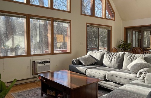 Bushkill Ski Chalet | Creek-side chalet with hot tub and fireplace