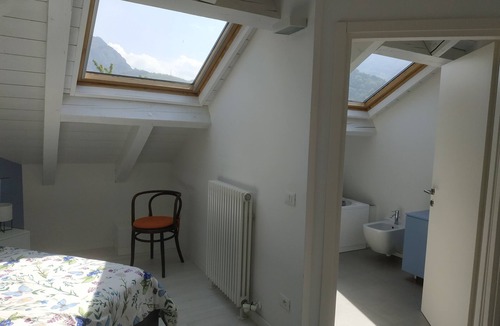 Martignano Apartment | Delightful attic in the hills, panoramic view, with pets allowed