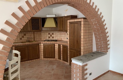 Laureana Cilento House | Description