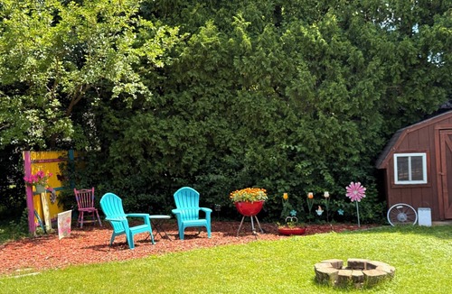 Appleton House | EAA Rental Home with landscaped yard, deck & AC
