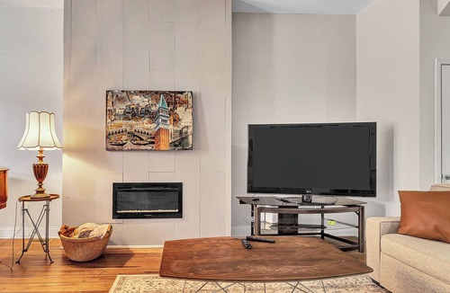 Old Goucher House | Elegant 3 bedroom Row Home Beside the Park High Ceilings, Natural Light & Views.