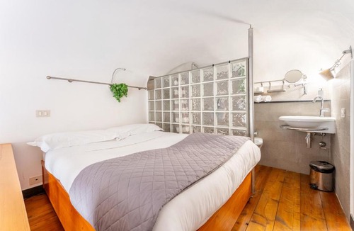 Rione XVIII Castro Pretorio Apartment | Esedra Loft, Like on a Boat Drifting Through Rome