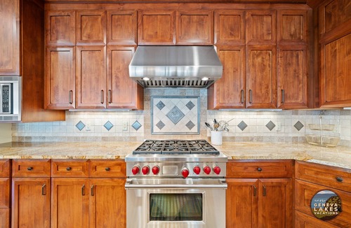 Lake Geneva House | Geneva Lakefront Luxury Home with Private Pier Tennis Court