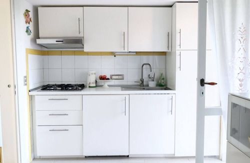 Pischina Salida Apartment | GuestHost - Comfy Flat W/Pool, Tennis Court & Private Beach!