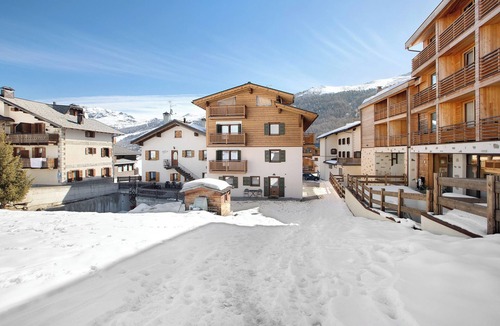 San Rocco Apartment | Holiday Apartment 'Baita Doss' with Mountain View, Balconies & Wi-Fi