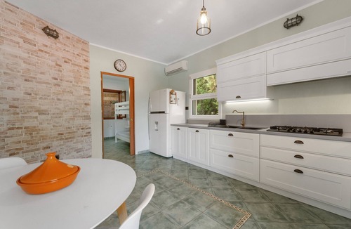 Buggerru House | Holiday Home 'Buggerru Hugo' with Sea View, Private Terrace and Air Conditioning