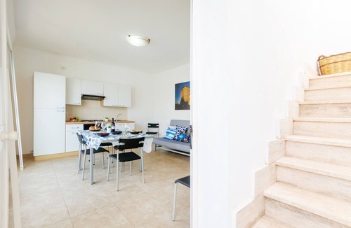 Boncore House | Holiday Home 'Libeccio Luxury Torre Lapillo' with Sea View, Shared Pool and Wi-Fi