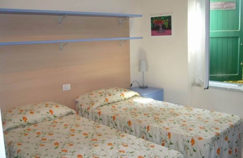 Giannella House | Holiday Home 'Residence Giannella - Robinia 35' with Private Garden and Air Conditioning