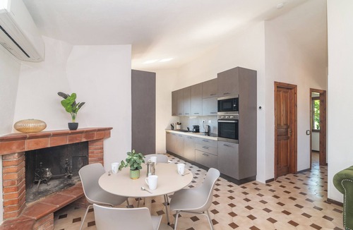 San Teodoro House | Holiday Home 'Rosmar' with Private Terrace, Shared Garden and Air Conditioning