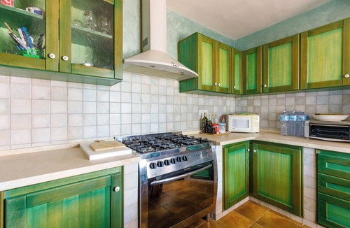 Santa Caterina House | Holiday Home 'Villetta Macchia Mediterranea' with Sea View, Private Terrace and Private Garden