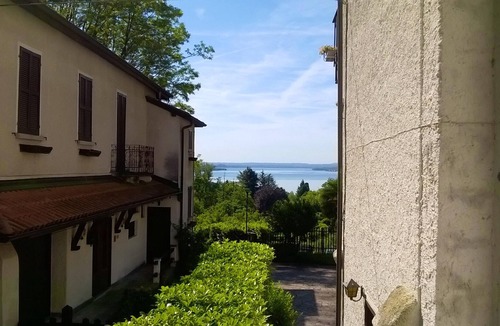 Nebbiuno Apartment | Homerez - Appartement 1 km away from the beach for 4 ppl. with balcony at Lesa