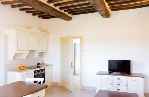 Marsciano Apartment | La Fiaccola, elegant suite with fireplace