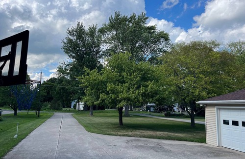 Oshkosh Cottage | Lake Winnebago Waterfront Retreat-Canoeing, Campfires & Stunning Sunsets