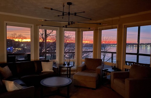 Arnolds Park Condo | Lakefront Luxury! Spacious corner condo, wrap around deck. 6 BB waterpark passes