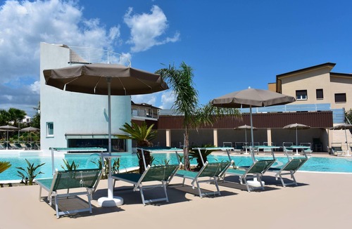 Casal Velino Apartment | Luxury Oasis: Apartment with Terrace and Charming Pool at Hyéle!