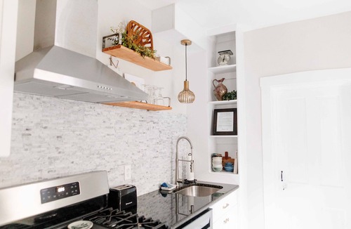 Lancaster House | Modern City home with off street parking, fenced backyard