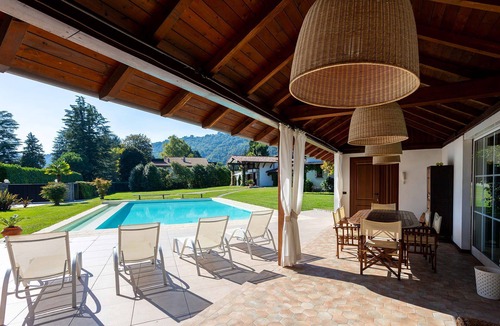 Solcio Villa | My Rental Homes - Villa Brin with tennis court, private sandy beach and dock