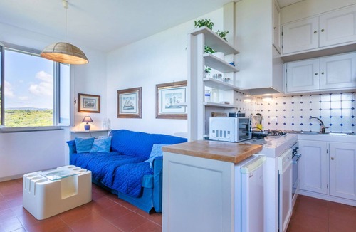 Rosignano Marittimo Apartment | Nice apartment for 7 people with pool, WIFI, TV and patio