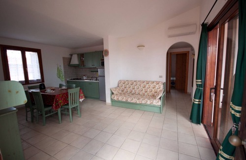Monte Petrosu Apartment | Nice apartment with roof terrace in an elegant complex with swimming pool
