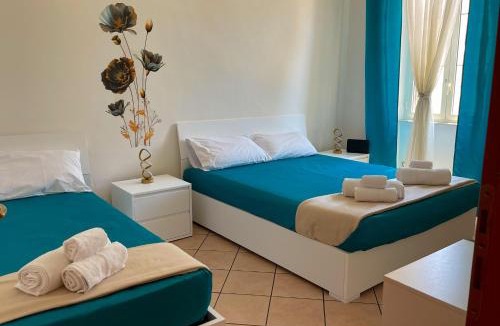 Nettuno Apartment | NIMPHAEA BLUE APARTMENT - Elegant Central Flat, Walk to Beach & Train Station