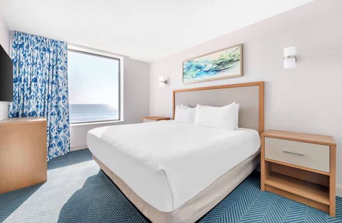 Ormond Parkway Hotel | Oceanfront Suite for Morning Surf, Sunset Strolls & Pool Relaxation
