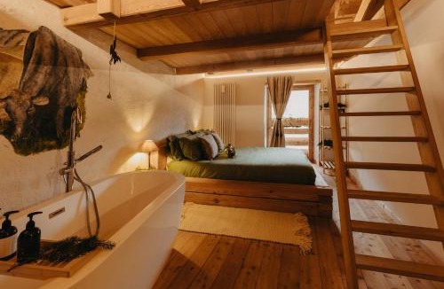 Sant'Orsola Terme Ski Chalet | Odomi maso nel bosco - Eleganza e Relax nella Natura