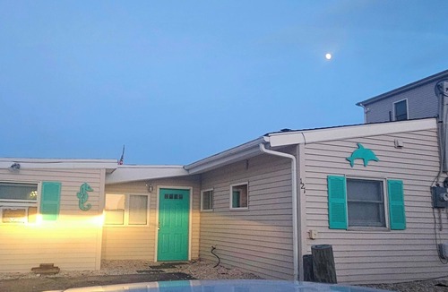 Mystic Island House | *Pet-Friendly Waterfront Tiki Escape with Fire Pit, bars, screened in porch