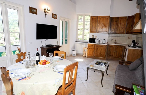 Pigna Apartment | Recently Renovated Flat In The Heart Of Pigna With Panoramic Views and a Balcony