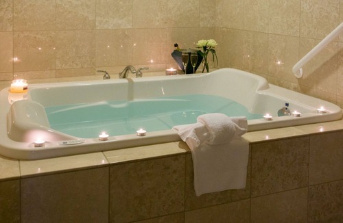 Country Club Estates Hotel | Rehoboth Beach Luxury Suite | Fireplace & Balcony