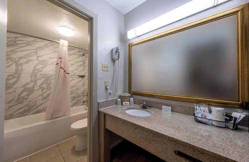 Charlottesville Hotel | Relaxing King Bed Room Perfect for Road-Trip Travelers Exploring Charlottesville