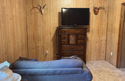 Gwinn House | Rustic Log Home Basement with Trail Access – Ideal Snowmobiler’s Winter Retreat