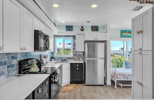 Holmes Beach Condo | Sandy Cheeks & Barefeet, Gorgeous interior Gulf beach Place, pool, on beach side