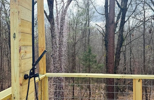 Tie Plant Cabin | Secluded one bedroom cabin with large deck overlooking a wooded gully.