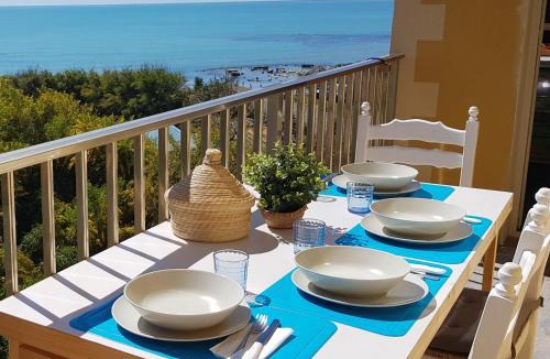Caucana-finaiti-casuzze-finaiti Nord Apartment | Sitting on the beach