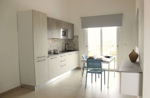Stintino Apartment | Spacious 40 square meter apartment with independent access via magnetic card. The accommodation includes a fully equipped kitchenette, a living room with a comfortable sofa bed for two, a bedroom with a double bed, and a private bathroom with a shower an