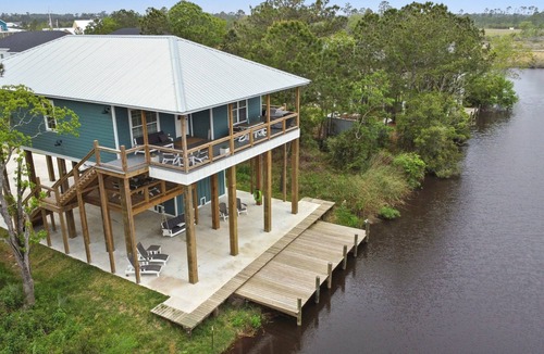 Shoreline Park House | Spacious new 4-bedroom house on a deep water canal in tranquil Bay St. Louis, MS