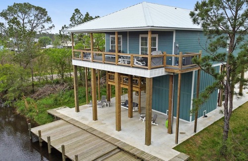 Shoreline Park House | Spacious new 4-bedroom house on a deep water canal in tranquil Bay St. Louis, MS