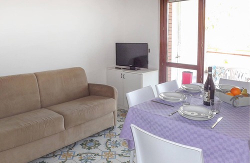 Villa Rosa Apartment | Spend a great vacation by the sea in this beachfront apartment.