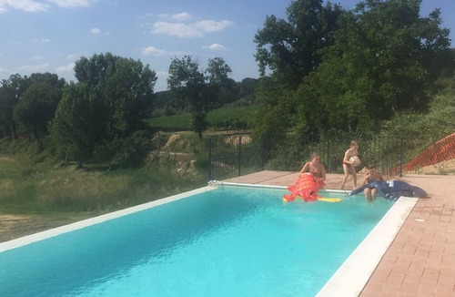 Schifanoia Villa | Stunning Umbrian Farmhouse and infinity pool with views of the valley D'orza