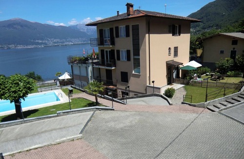 Pino Lago Maggiore Apartment | Tastefully furnished 2½-room apartment in a beautiful villa with pool