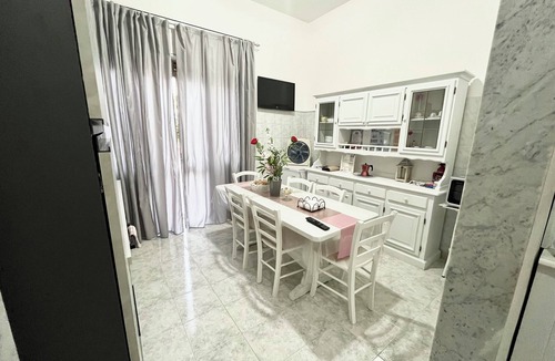 Carosino House | The pink corner is a facility located in a small town a few kilometers from the sea
