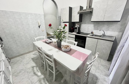 Carosino House | The pink corner is a facility located in a small town a few kilometers from the sea